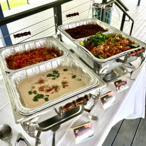 Taco bar buffet at Reston National Golf Course with a variety of tacos, toppings, and sides displayed for guests, highlighting casual dining and event catering.